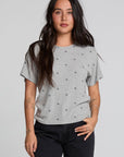Front view of a woman wearing the Chaser Leonor Light Heather Grey Tee on a neutral background