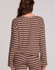 Back view of a woman wearing the Chaser Lunnah Nutty Brown Top and matching striped pants on a neutral background 