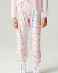 Front view of a girl wearing the Chaser Party Hearts Girls Jogger on a neutral background with hands at sides and shirt