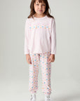 A full body front view of a girl wearing the Chaser Party Hearts Girls Tee on a neutral background