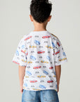 Back view of a boy wearing the Chaser Race Day Boys Tee on a neutral background with jeans