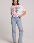 A full body front view of a woman wearing the Chaser Rodeo Show Tee on a neutral background