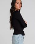 Side body view of a woman wearing the Chaser Silva Black Fullsleeve Top on a neutral background