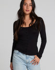 A full body front view of a woman wearing the Chaser Silva Black Fullsleeve Top on a neutral background