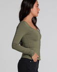 Side view of a woman wearing the Chaser Silva Forager Green Fullsleeve Top on a neutral background