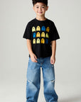 A full body front view of a boy wearing the Chaser Spooky Friends Boys Tee on a neutral background