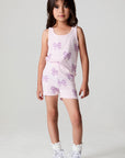 Full body front view of a girl wearing the Chaser Check Bow Shorts and tank on a neutral background 