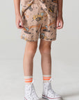 Front view of a boy wearing the Chaser Construction Days Shorts on a neutral background