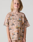 Front view of a boy wearing the Chaser Construction Days Tee on a neutral background