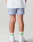 Back view of a boy wearing the Chaser  Cozy Beach Short on a neutral background