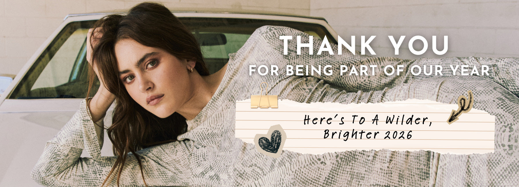 Woman sitting in a car with text overlay thanking viewers for being part of Chaser's year and wishing a wilder, brighter 2026