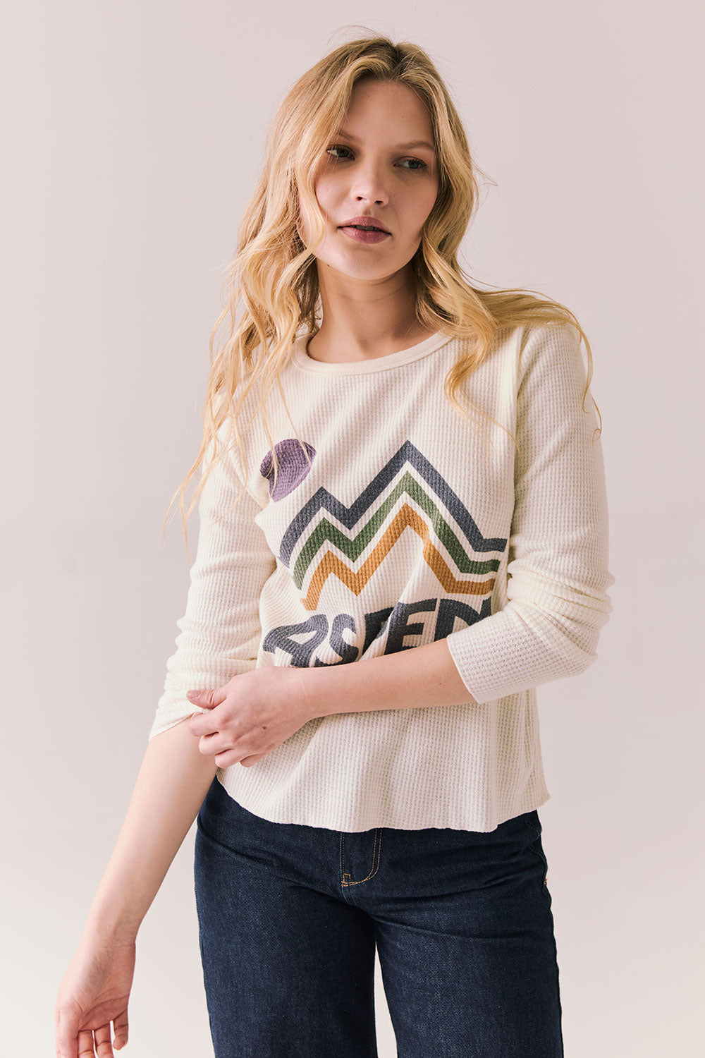 Front view of model wearing Aspen 1979 Long Sleeve in white
