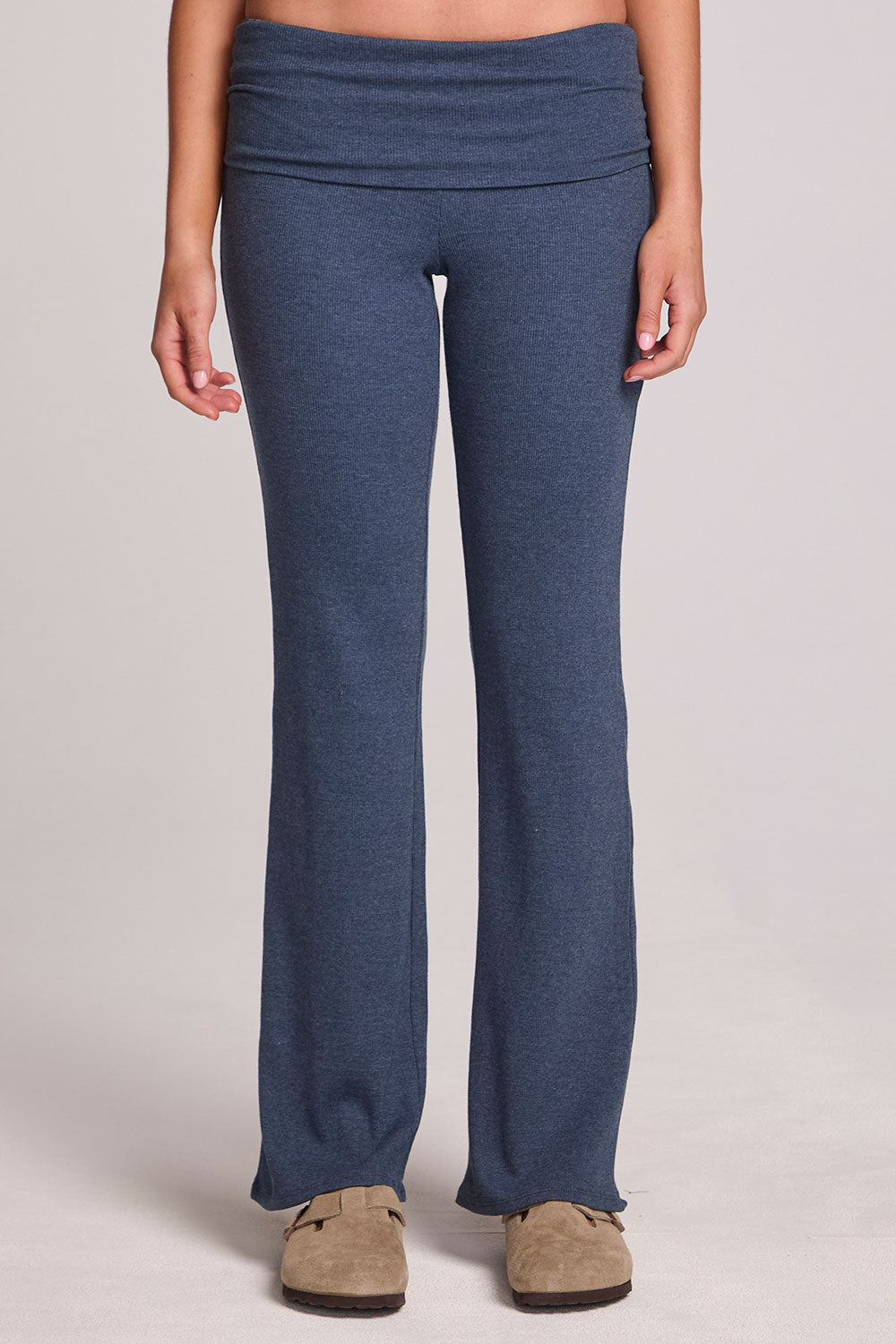Front view of a woman wearing the Chaser Noorh Dark Denim Pants with arms at side