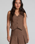 A front view of a woman wearing the Chaser Pea Choco Check Waistcoat on a neutral background with arms at her sides